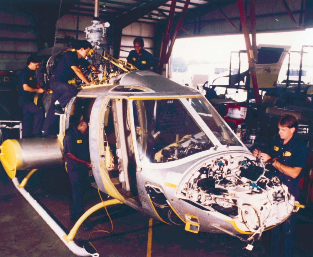1970s crews repairing Bell 212