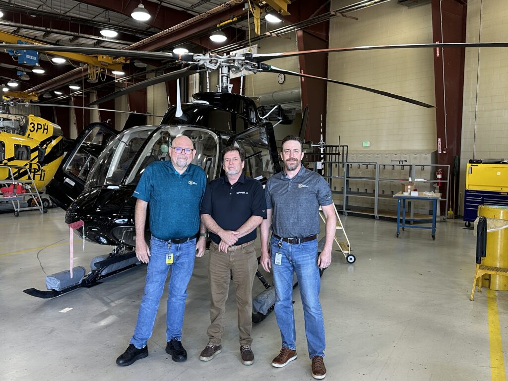 Standing from left to right is President of PHI MRO Services Tom Neumann, Director of Sales at GPMS John Byus and Director of Maintenance Part 145 Josh Perkins